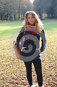 Young woman in autumn park