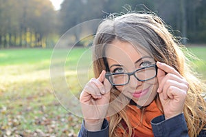 Young woman in autumn park