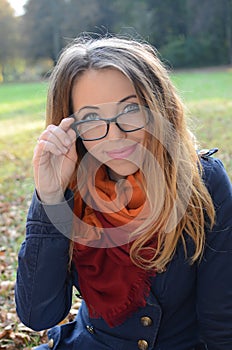 Young woman in autumn park