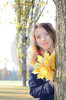 Young woman in autumn park