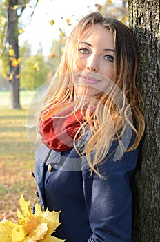 Young woman in autumn park