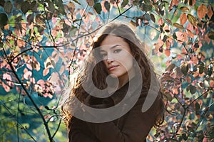 Young woman autumn portrait outdoor natural light