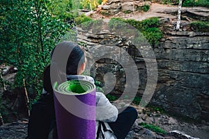 Young woman backpacker enjoy the view at mountain peak