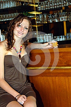 Young woman at bar