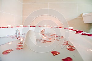 Young Woman Bathing at Health Spa