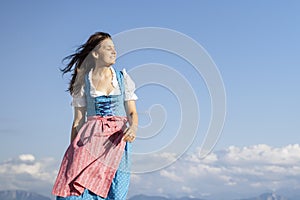 Young woman in bavarian traditional dress dirndl