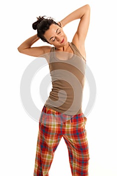 Young woman be sleepy wearing pajamas isolated