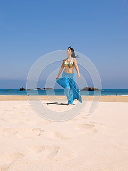 Young woman in the beach