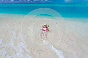 Young woman on the beach" border="0