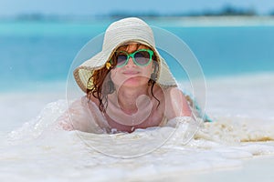 Young woman on the beach" border="0