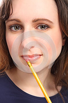 Young woman with beautiful eyes deep in thought