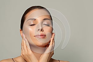 Young woman with beautiful face, eyes closed