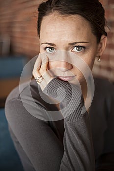 Young Woman with Beautiful Green Eyes and Brown Hair