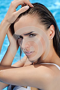 Young woman beauty portrait in water photo