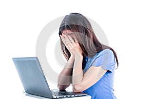 A young woman bent her head Put your hands on the face With laptop,notebook ,computers, error, mistake