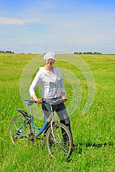 Young woman with a bicycle