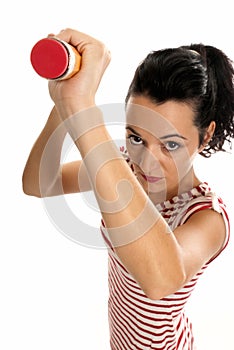 Young woman with big pencil eraser rubber isolated