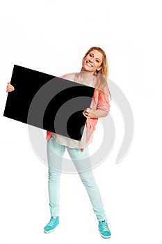 Young woman with black advertising sign