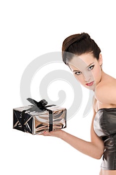 Young woman in black corset holding Christmas photo