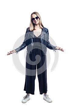 Young woman in a black leather jacket wearing black sunglasses. Style and fashion. Full height. Isolated on white background.