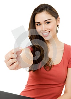 Young woman with blank credit card