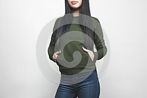 young woman in blank green sweatshirt