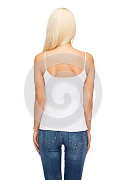 Young woman in blank white tank top