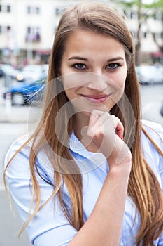 Young woman with blond hair in the city