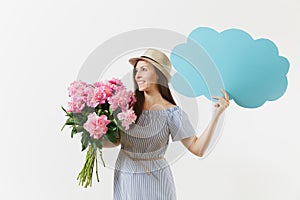 Young woman in blue dress, hat holding blank empty say cloud, speech bubble with place text, bouquet of pink peonies