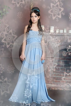 Young girl in blue vintage dress late 19th century