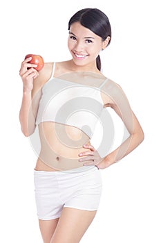 Young woman body and hand holding red apple