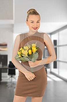Young woman with a bouquet of flowers