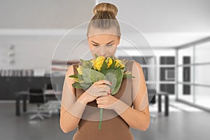 Young woman with a bouquet of flowers