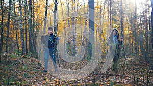 Young woman and a boy on hiking. Scandinavian walk