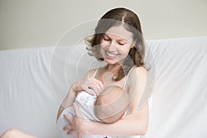 Young woman breastfeeding