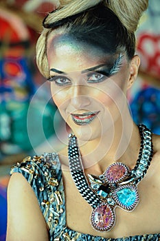 Young woman with bright creative make-up