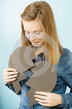 Young woman with broken heart