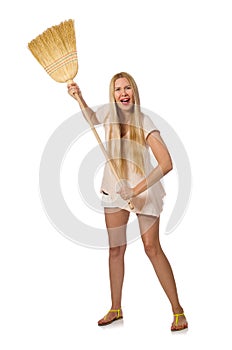 The young woman with broom isolated on white