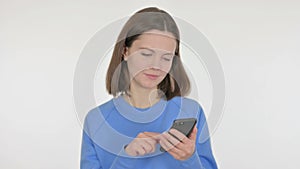 Young Woman Browsing Smartphone on White Background