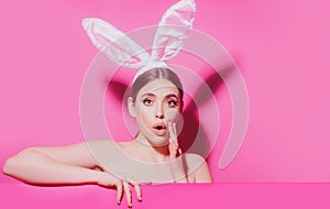 Young woman with bunny ears. Thinking surprised. Funny emotions, excited expressing.