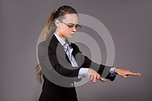 The young woman businesswoman pressing virtual buttons