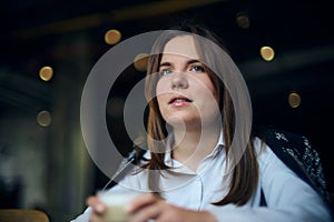 Young woman in a cafe