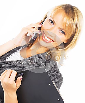 Young woman calling by cellular phone