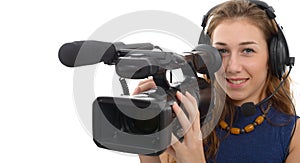 Young woman with a camcorder, on white background