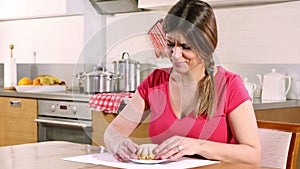 Young woman can not resist the temptation to eat a cake