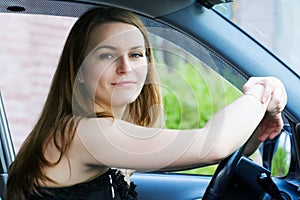 Young woman in the car.