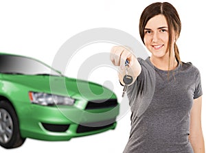 Young woman with car keys and new auto