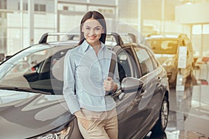 Young Woman in a Car Rental Service Assistant Concept