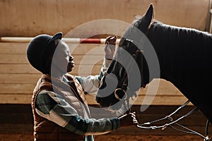 Young Woman Caring for Horses