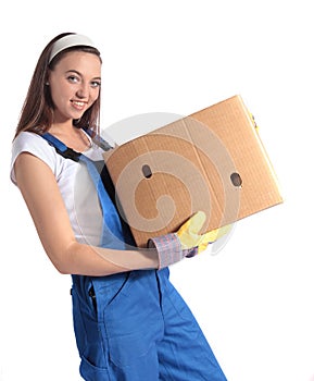 Young woman carrying moving box